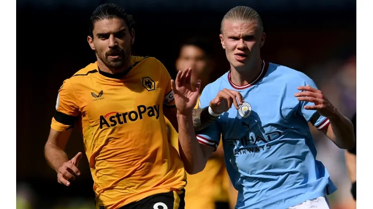 Ruben Neves of Wolves and Erling Haaland of Manchester City