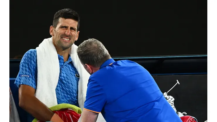 Novak Djokovic of Serbia receives attention during a medical time out