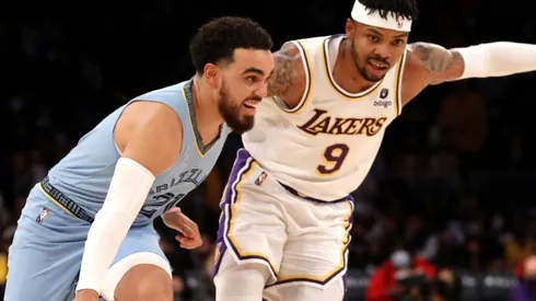 Tyus Jones of the Memphis Grizzlies and Kent Bazemore of the Los Angeles Lakers