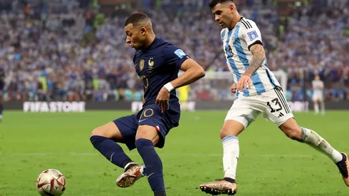 Kylian Mbappe against Cristian Romero.