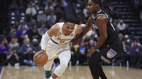 Russell Westbrook #0 of the Los Angeles Lakers drives to the basket against Davion Mitchell #15 of the Sacramento Kings