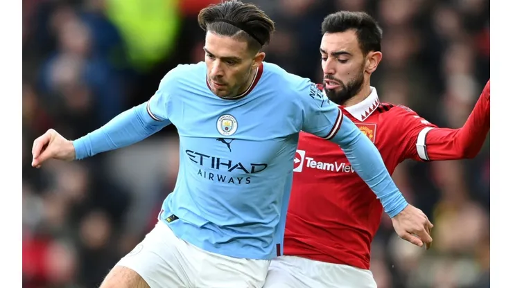 Jack Grealish of Manchester City and Bruno Fernandes of Manchester United