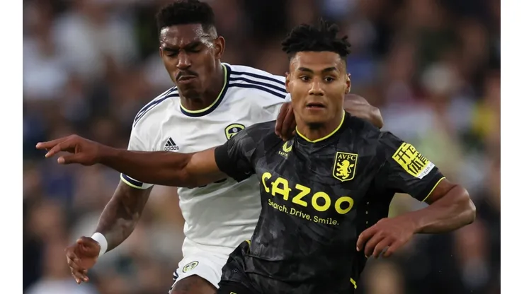 Junior Firpo of Leeds and Ollie Watkins of Aston Villa