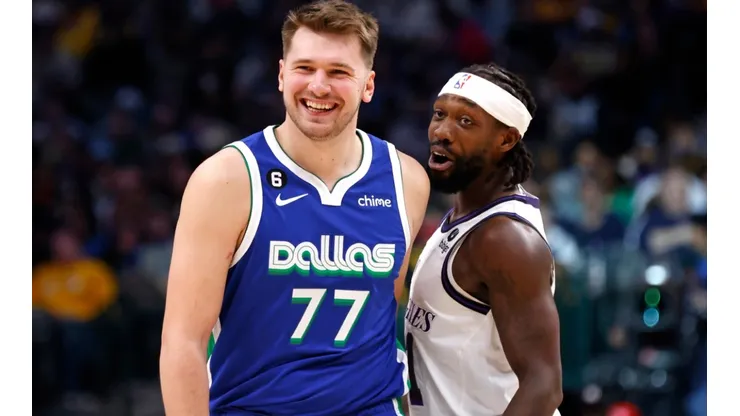 Luka Doncic of the Dallas Mavericks and Patrick Beverley of the Los Angeles Lakers