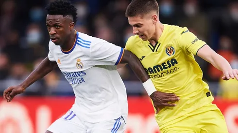 Vinicius of Real Madrid and Juan Foyth of Villarreal
