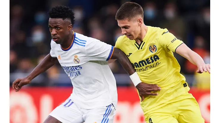 Vinicius of Real Madrid and Juan Foyth of Villarreal