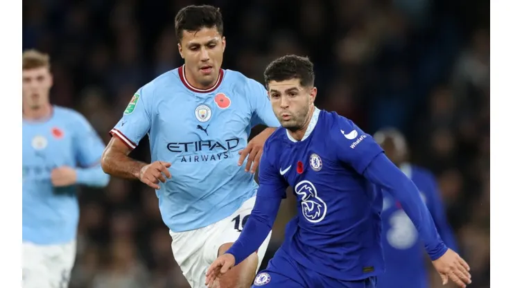 Rodri of Manchester City and Christian Pulisic of Chelsea