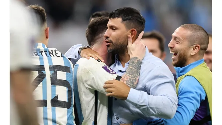 Former Argentine player Sergio Aguero congratulates Lionel Messi of Argentina after the team's victory in the penalty shoot out during the FIFA World Cup Qatar 2022 quarter final match between Netherlands and Argentina at Lusail Stadium on December 09, 2022 in Lusail City, Qatar.