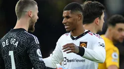 David De Gea of Manchester United celebrates their side's win with teammate Marcus Rashford