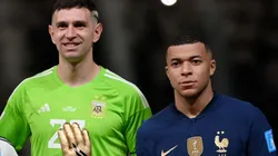 Emiliano Martinez of Argentina and Kylian Mbappe of France