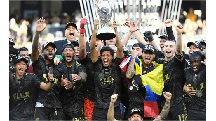 Carlos Vela of Los Angeles FC lifts the championship trophy