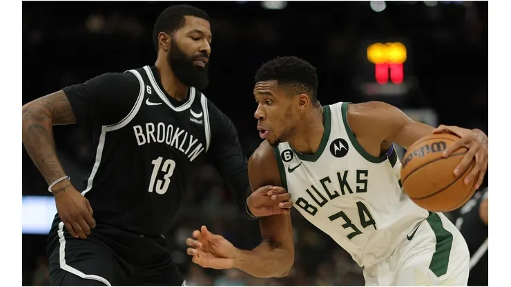 Giannis Antetokounmpo of the Milwaukee Bucks is defended by Markieff Morris of the Brooklyn Nets