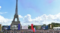 Crowd in front of the Eiffel Tower in Paris during the Olympic Games handover ceremony