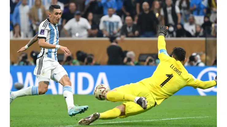 Angel Di Maria of Argentina scores the team's second goal past Hugo Lloris of France