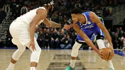 Giannis Antetokounmpo of the Milwaukee Bucks is defended by Lamar Stevens of the Cleveland Cavaliers