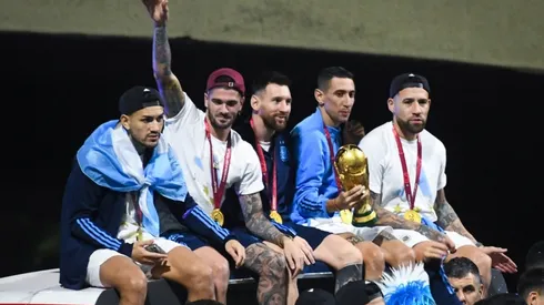 Leandro Paredes, Rodrigo De Paul, Lionel Messi, Angel Di Maria and Nicolas Otamendi celebrate on the bus during the arrival of the Argentina men's national football team after winning the FIFA World Cup Qatar 2022 on December 20, 2022 in Buenos Aires, Argentina.