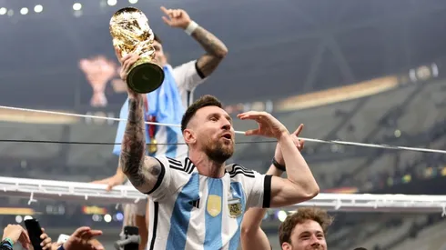 Lionel Messi of Argentina celebrates with the FIFA World Cup Qatar 2022 Winner's Trophy after the team's victory during the FIFA World Cup Qatar 2022 Final match between Argentina and France at Lusail Stadium on December 18, 2022 in Lusail City, Qatar.