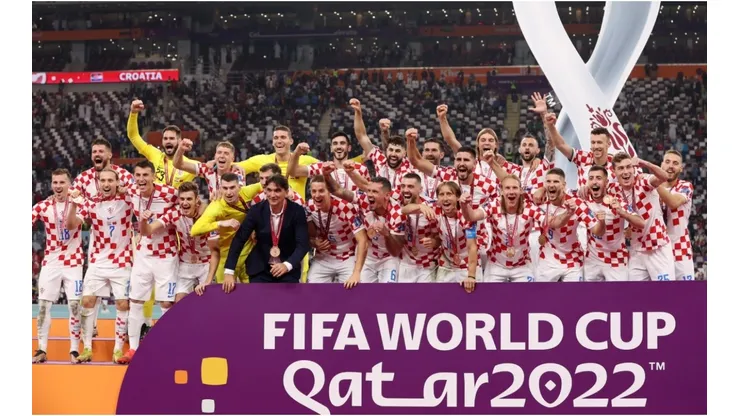 Croatia players celebrate with their FIFA World Cup Qatar 2022 third placed medals