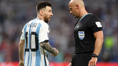 Lionel Messi and Szymon Marciniak