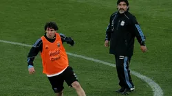 Argentina's head coach Diego Maradona watches on as Lionel Messi looks to pass during a team training session on June 6, 2010 in Pretoria, South Africa.