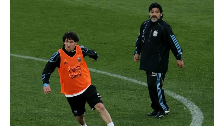 Argentina's head coach Diego Maradona watches on as Lionel Messi looks to pass during a team training session on June 6, 2010 in Pretoria, South Africa.