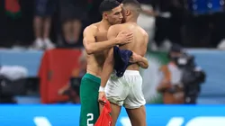 Achraf Hakimi of Morocco swaps shirts with Kylian Mbappe of France