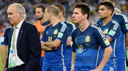 Head coach Alejandro Sabella of Argentina looks on with Lionel Messi after 2014 World Cup final