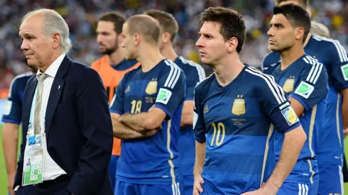 Head coach Alejandro Sabella of Argentina looks on with Lionel Messi after 2014 World Cup final