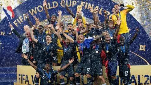 The team of France celebrates with the World Cup trophy after the 2018 FIFA World Cup Final