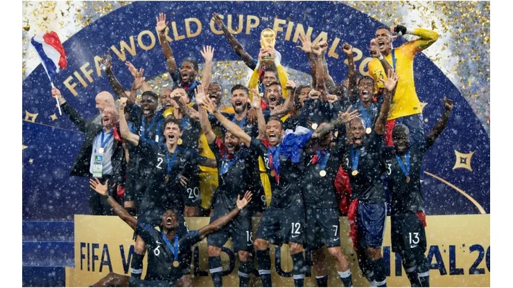 The team of France celebrates with the World Cup trophy after the 2018 FIFA World Cup Final