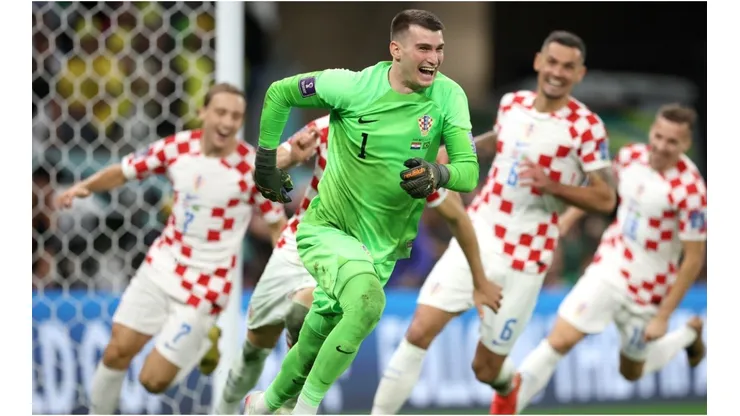 Dominik Livakovic of Croatia celebrates the win via a penalty shootout