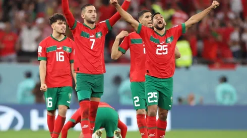 Hakim Ziyech and Yahya Attiat-Allah of Morocco celebrate during the penalty shootout in the FIFA World Cup Qatar 2022 Round of 16 match between Morocco and Spain at Education City Stadium on December 06, 2022 in Al Rayyan, Qatar.