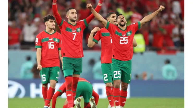 Hakim Ziyech and Yahya Attiat-Allah of Morocco celebrate during the penalty shootout in the FIFA World Cup Qatar 2022 Round of 16 match between Morocco and Spain at Education City Stadium on December 06, 2022 in Al Rayyan, Qatar.
