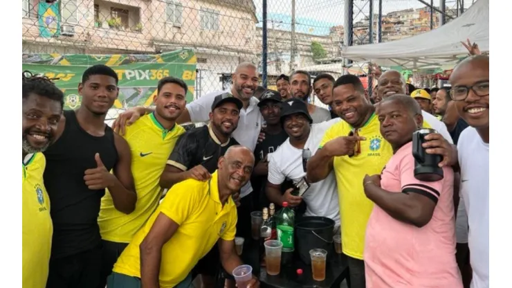 Adriano drinking with buddies