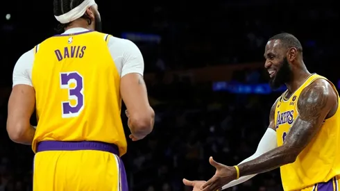 LeBron James of the Los Angeles Lakers reacts to Anthony Davis
