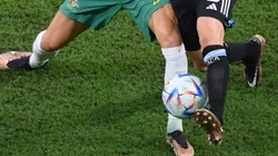 Players fight for the ball at the World Cup