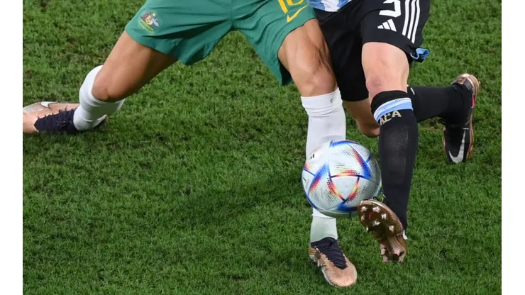 Players fight for the ball at the World Cup