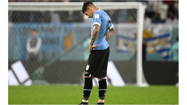 Mathias Olivera of Uruguay shows dejection after the team fails to qualify for the knockout stage