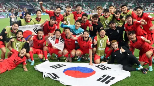 Korea Republic players celebrate