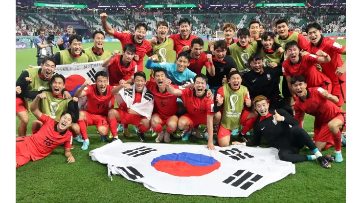 Korea Republic players celebrate