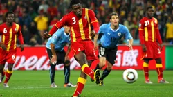 Asamoah Gyan of Ghana shoots a late penalty
