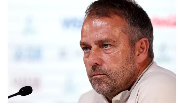 Hansi Flick, Head Coach of Germany, speaks during the Germany Press Conference at the Main Media Center on November 30, 2022 in Doha, Qatar.