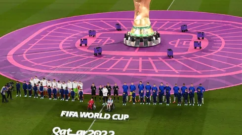 Players and match officials line up prior to the FIFA World Cup Qatar 2022 match