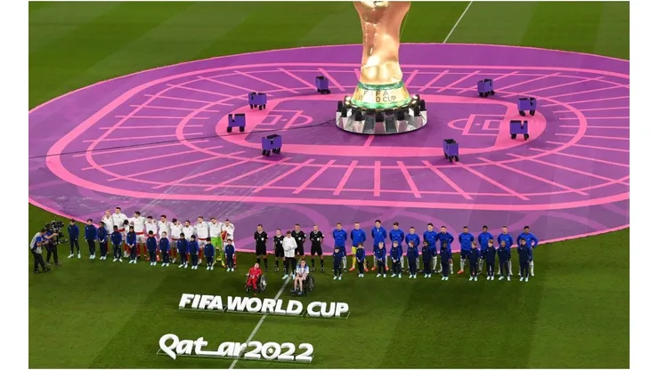 Players and match officials line up prior to the FIFA World Cup Qatar 2022 match