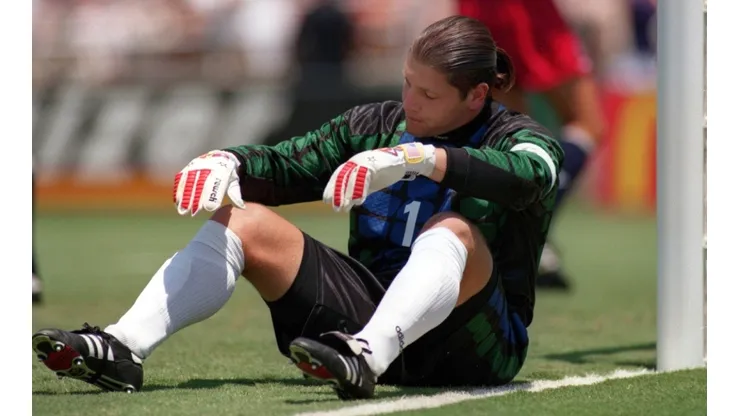 TONY MEOLA DEJECTED AFTER CONCEDING THE OPENING GOAL ON HIS NEAR POST SCORED BY DAN VASILE PETRESCU FOR ROMANIA DURING THEIR 1994 WORLD CUP GROUP A MATCH