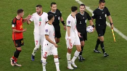 Morocco players protest to match officials at the half time