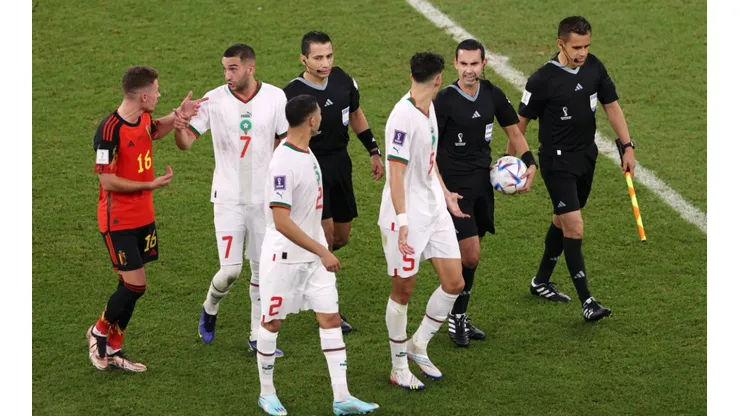 Morocco players protest to match officials at the half time