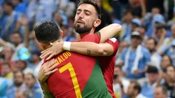 Bruno Fernandes celebrates with Cristiano Ronaldo.