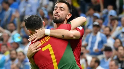 Bruno Fernandes celebrates with Cristiano Ronaldo.