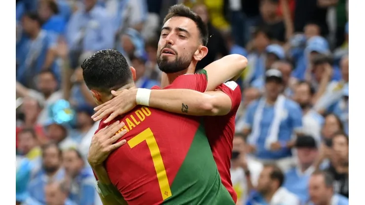Bruno Fernandes celebrates with Cristiano Ronaldo.